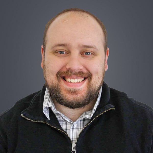 Hospital Director, Ben Blood, smiling while facing forward