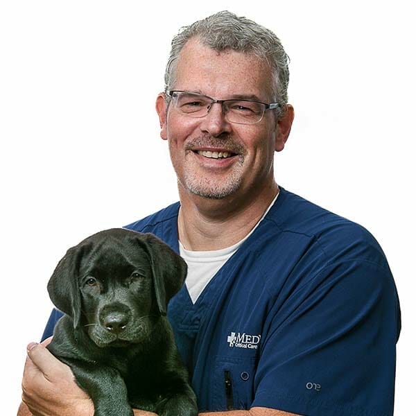 Dr. Shane DeWitt with pet