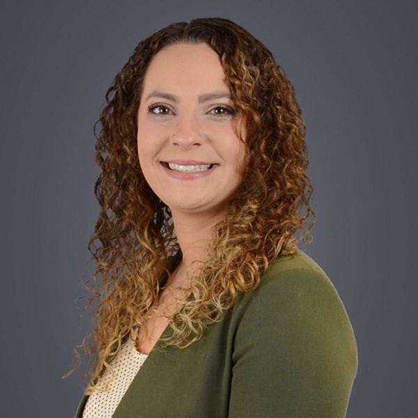 Hospital Director, Jeanna Beck, smiling happily.