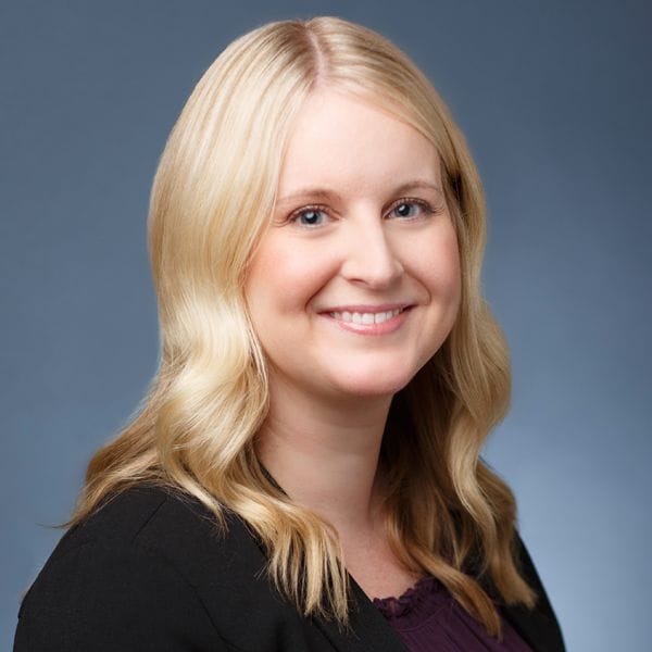 Hospital Director, Kim McLaughlin, smiling happily.